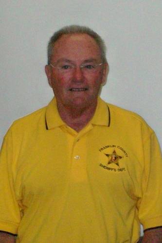 Larry Plott in yellow shirt