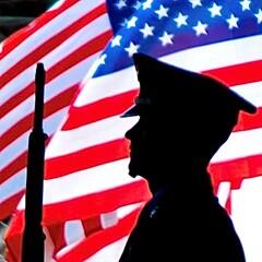 silhouette of an armed services member