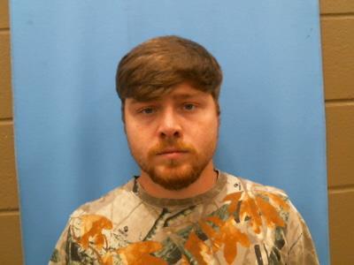 Mugshot of SUTTON, DYLAN